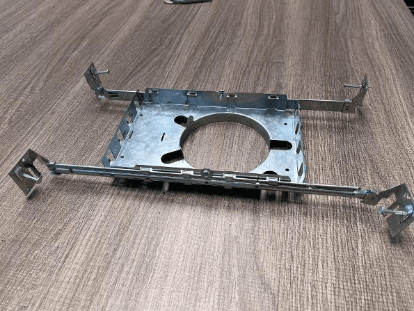 New Construction Mounting Plate, 4-Inch Round Hole with Hanger Bar and Lips, Grey