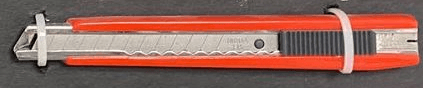 Discontinued Item- Small red plastic jacket blade slide auto lock 5inx degreesin