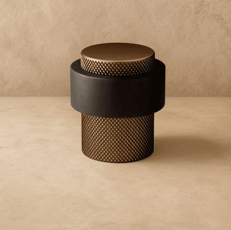 Desist Door Stop Knurled Color: Antique Brass, Dimensions: D1.5" x H1.6", Finish: Brass, Weight: 120g, 1 yr Wrrty